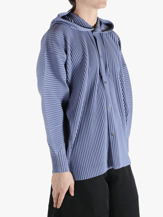 Blue jacket worn by a person, showing the jacket's fit