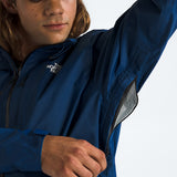 Blue jacket worn by a person, showing the jacket fit
