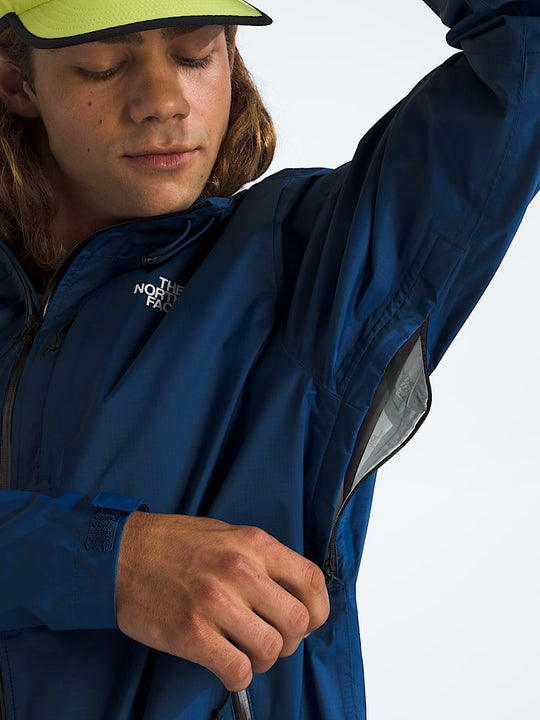 Blue jacket worn by a person, showing the jacket fit
