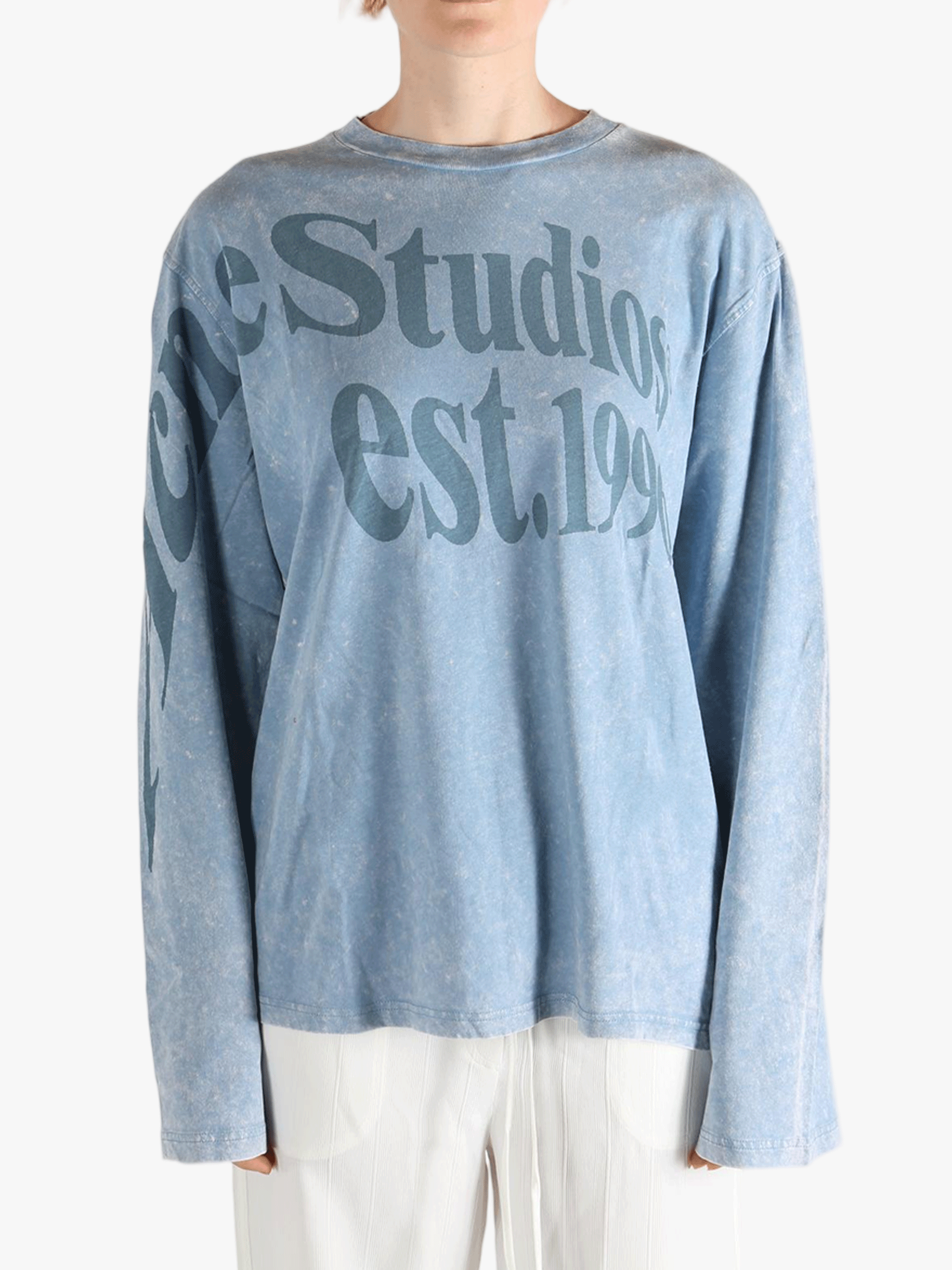 Blue t-shirt worn by a person, showing the t-shirt fit