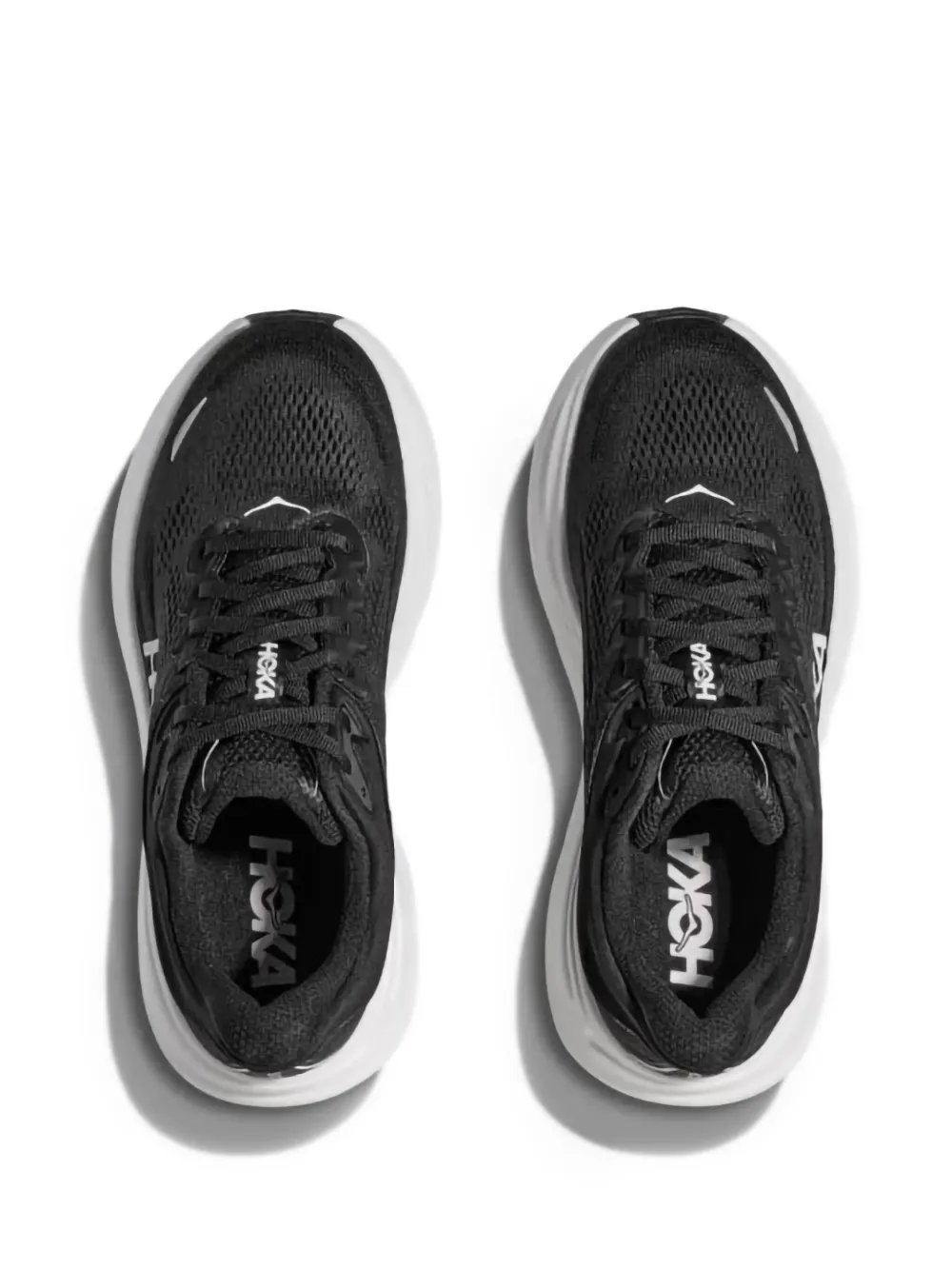 Black sneakers, vertical view