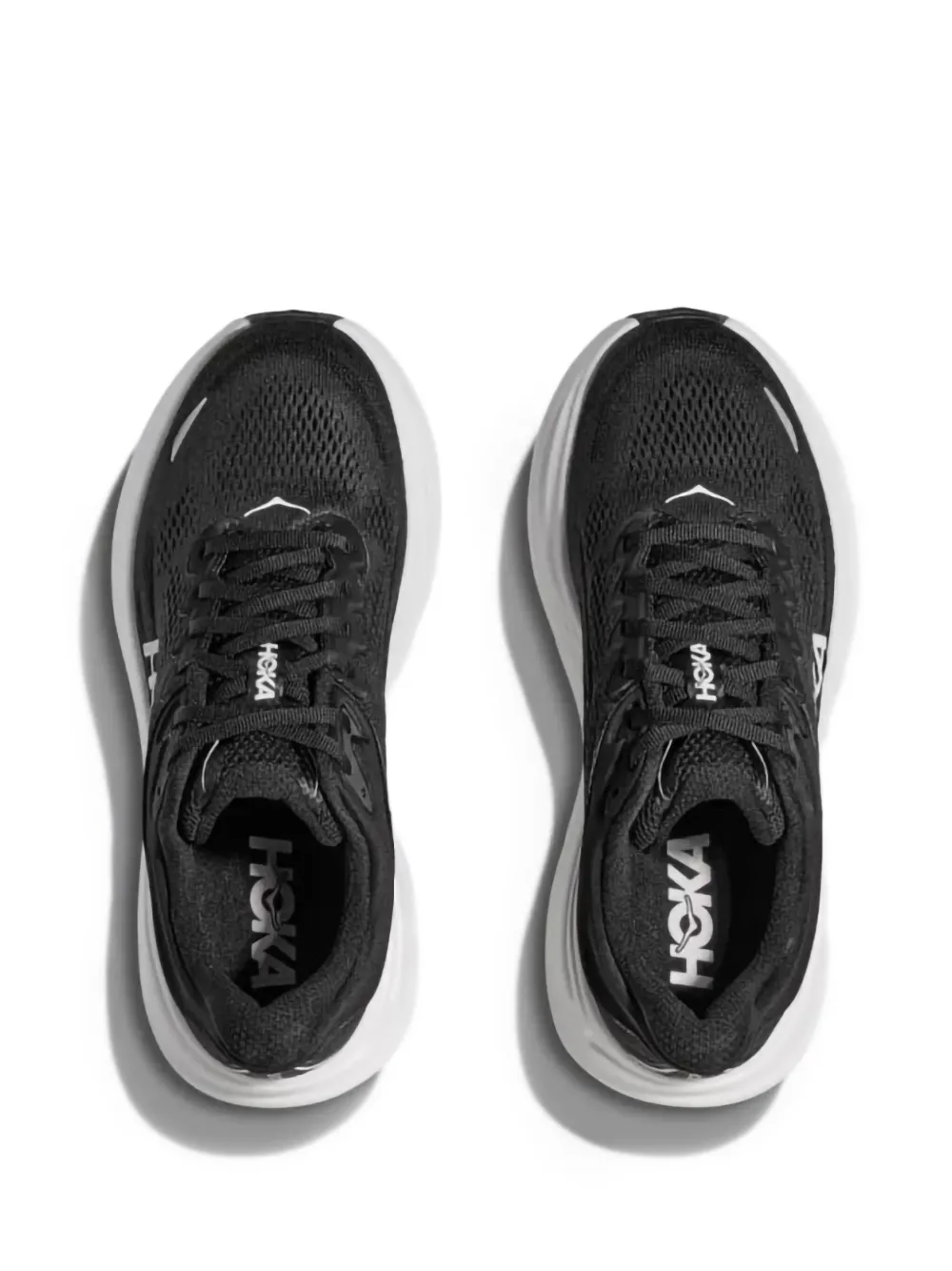 Black sneakers, vertical view