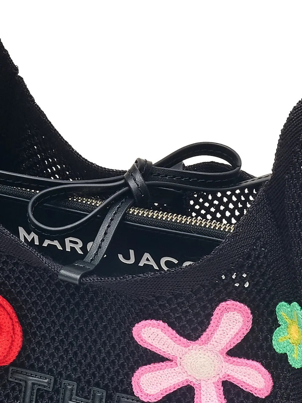 Close up of the black bag, showing texture of the cotton fabric