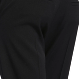 Close up of black pant, showing texture of the wool fabric