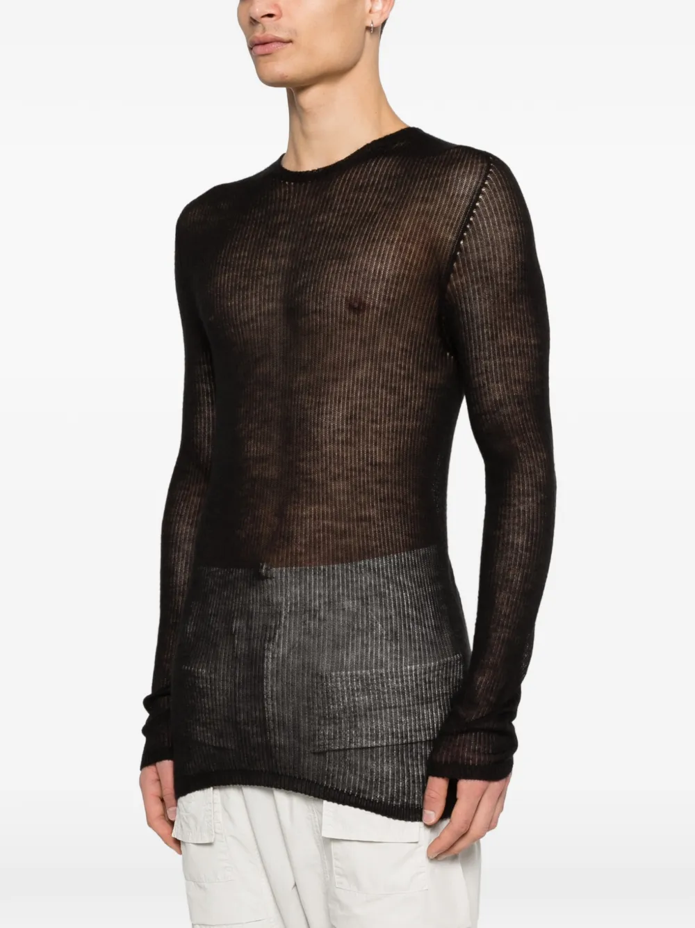 Black t-shirt worn by a person, showing the t-shirt fit