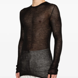 Black t-shirt worn by a person, showing the t-shirt fit