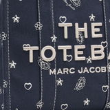 Close up of navy bag,showing texture of the cotton fabric
