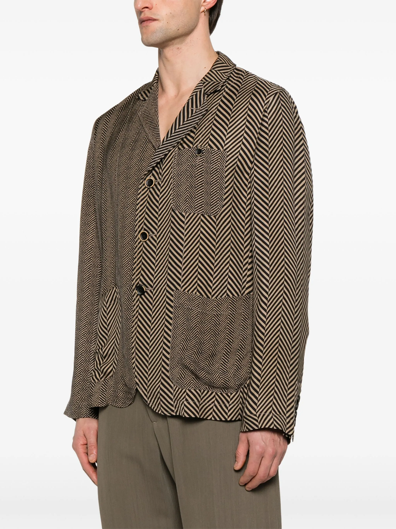 Brown and black striped jacket, fworn by a person, showing the jacket fit