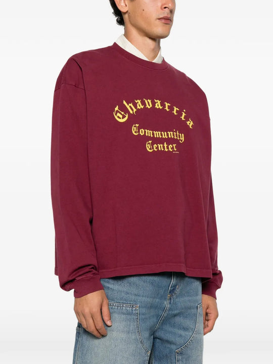 Burgundy t-shirt worn by a person, showing the t-shirt fit