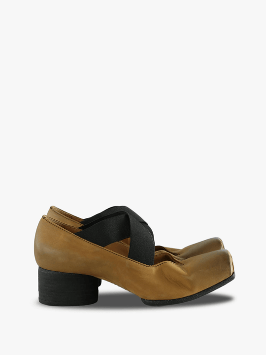 Tan shoes, side view