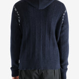 Navy cardigan worn by a person, showing the cardigan's fit