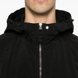 Close up of Black parka, showing texture of the polyamide fabric