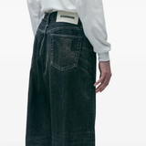 Blue pants worn by a person, showing the pants fit