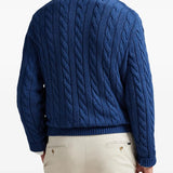 Blue sweats worn by a person, showing the sweats fit