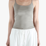 Grey tops worn by a person, showing the tops fit