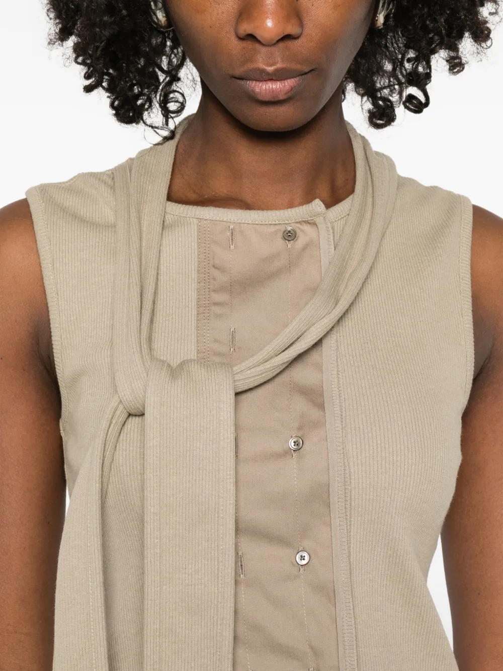 Close up of tan top, showing texture of the Cotton fabric