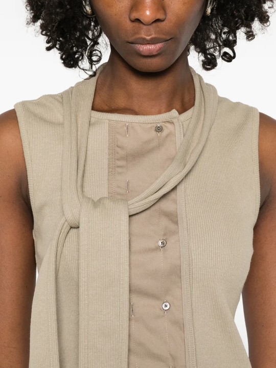 Close up of tan top, showing texture of the Cotton fabric