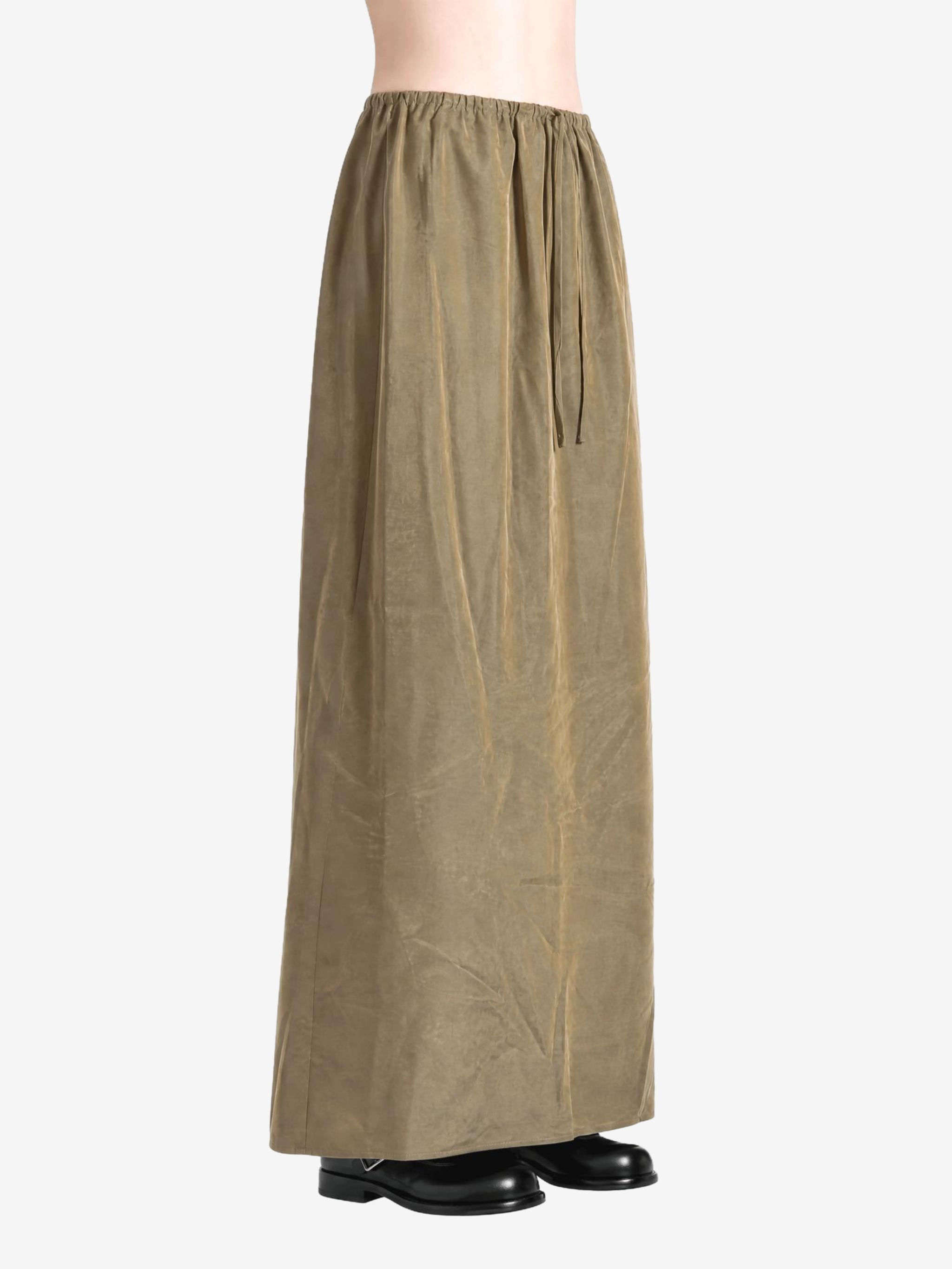 Tan skirt worn by a person, showing the skirt fit