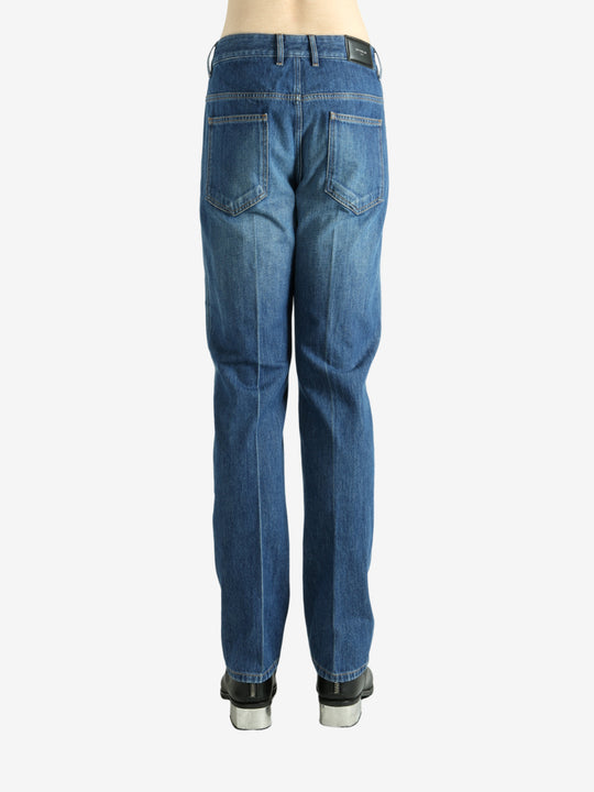 Blue pants worn by a person, showing the pants fit