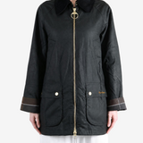 Black jacket worn by a person, showing the jacket fit