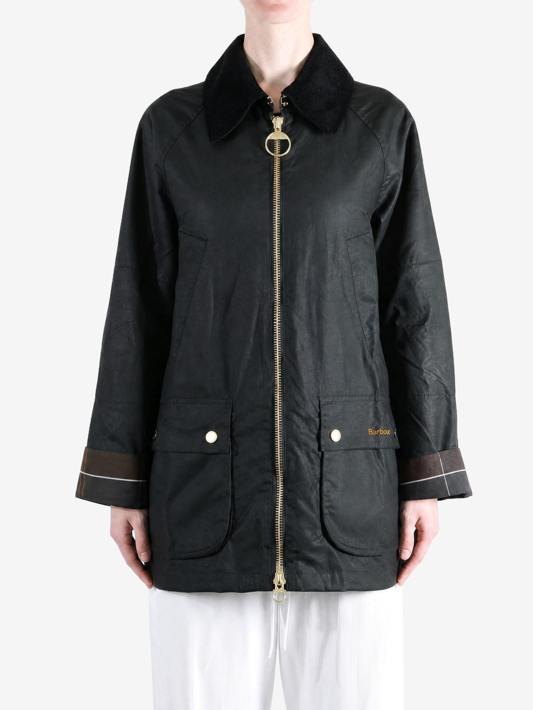 Black jacket worn by a person, showing the jacket fit