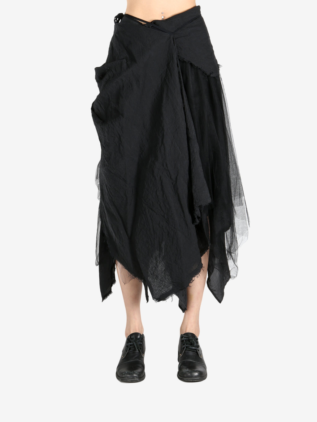 Black skirt worn by a person, showing the skirt's fit