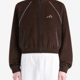 Brown jacket worn by a person, showing the jacket fit