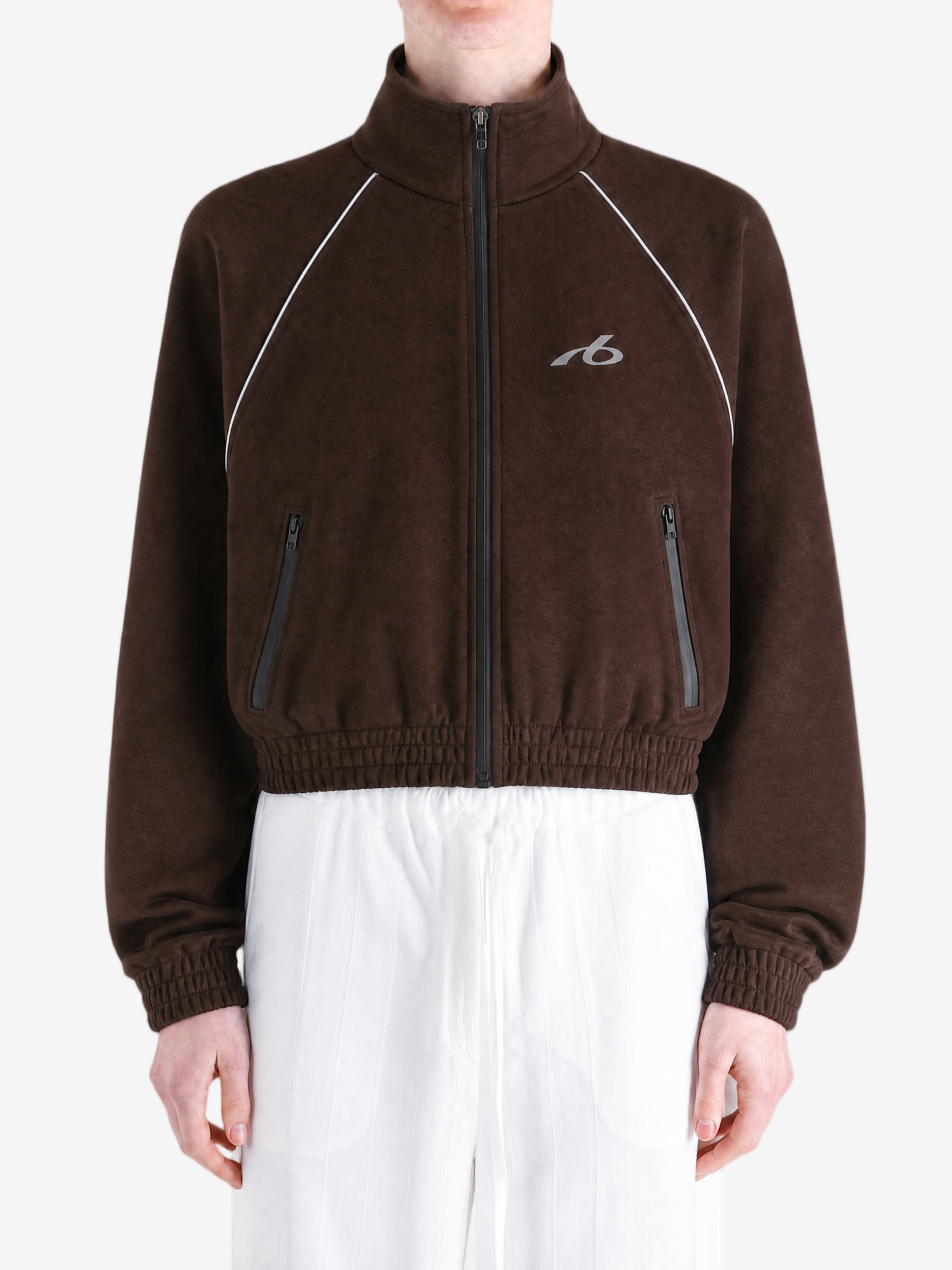 Brown jacket worn by a person, showing the jacket fit