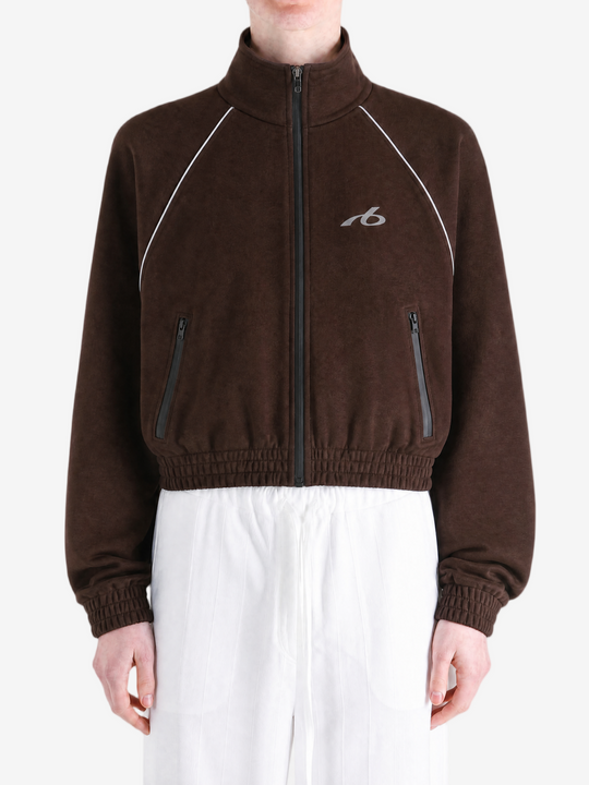 Brown jacket worn by a person, showing the jacket fit