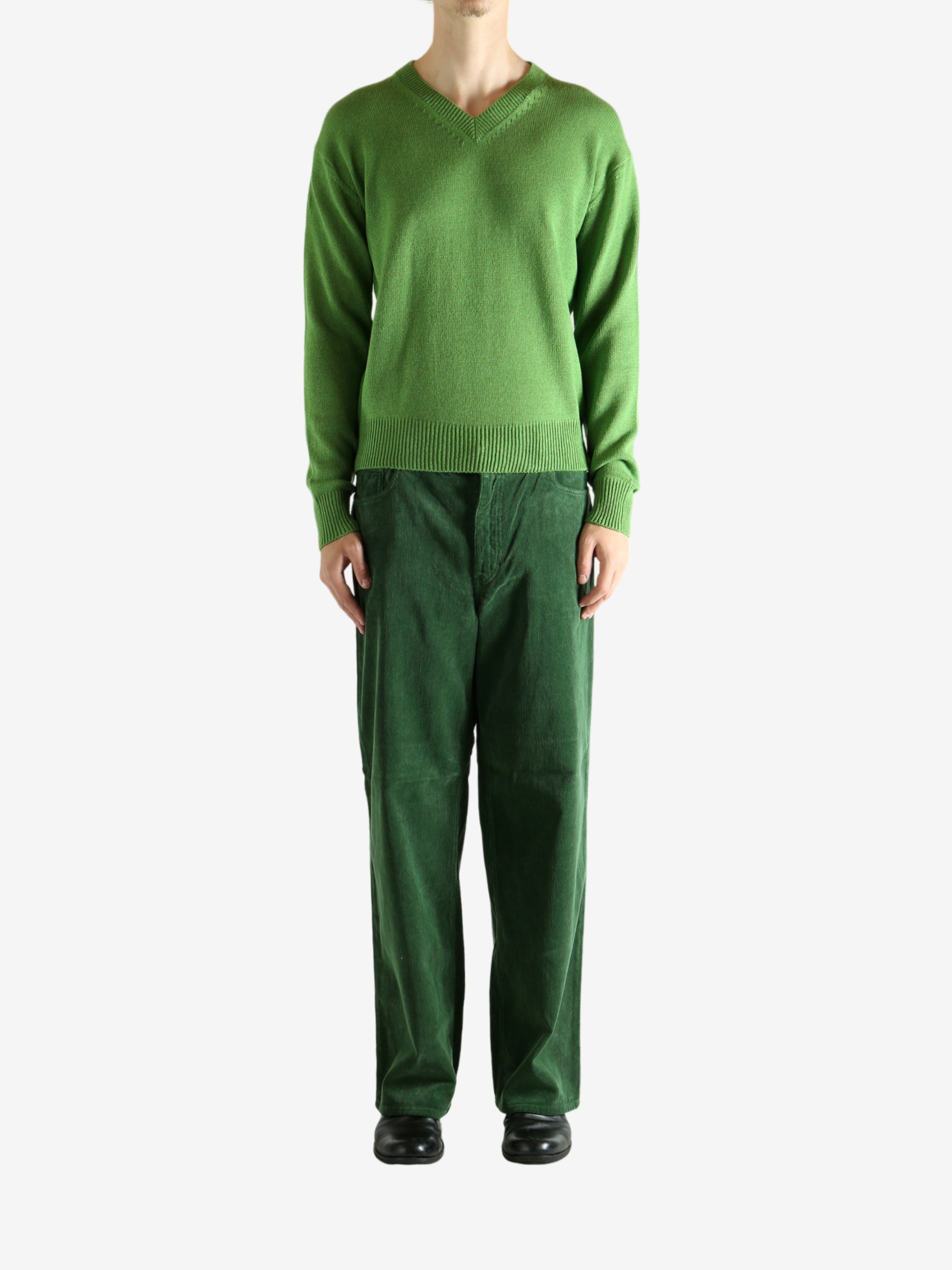 Green knitwear, full body view