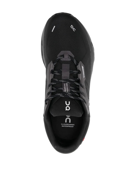 Black sneaker, front view