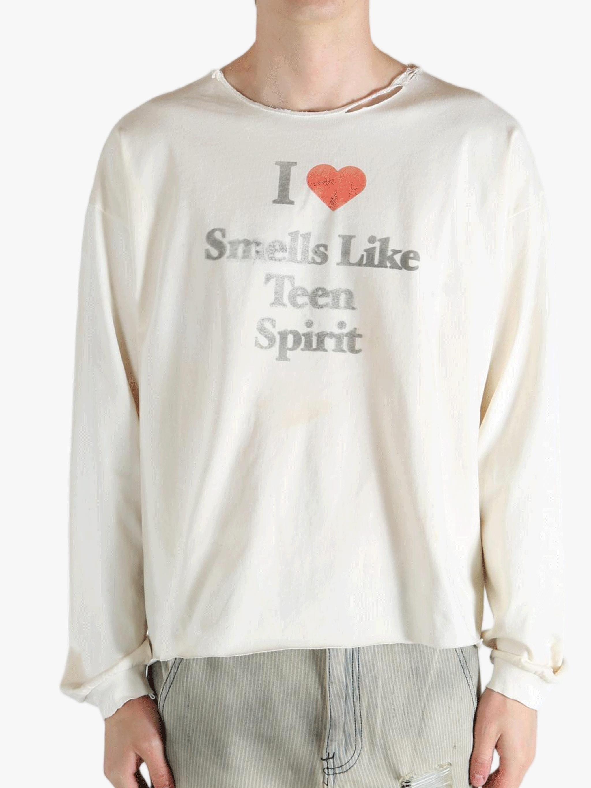 White top worn by a person, showing the top fit