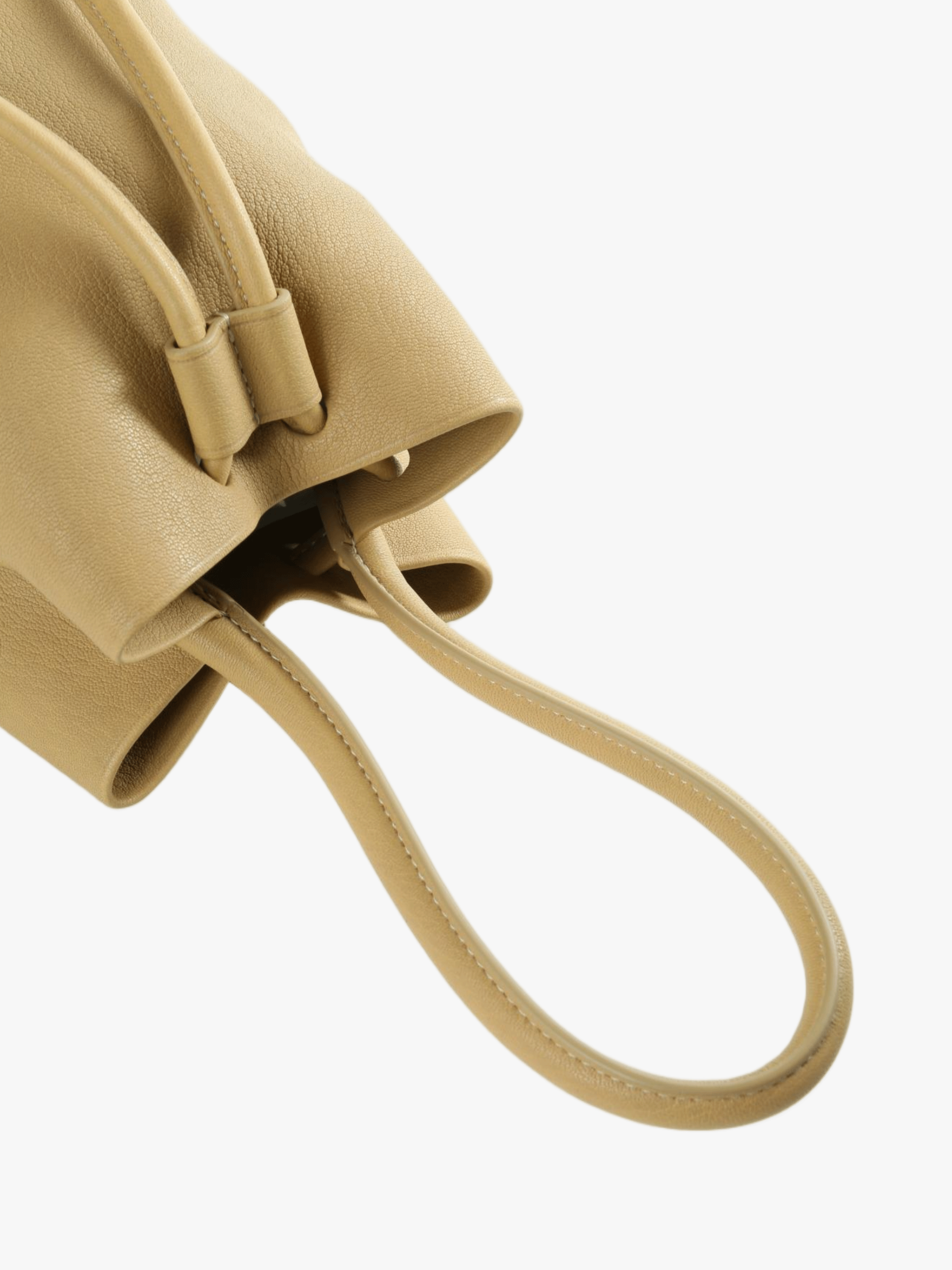 Close up of tan bags, showing texture of the fabric