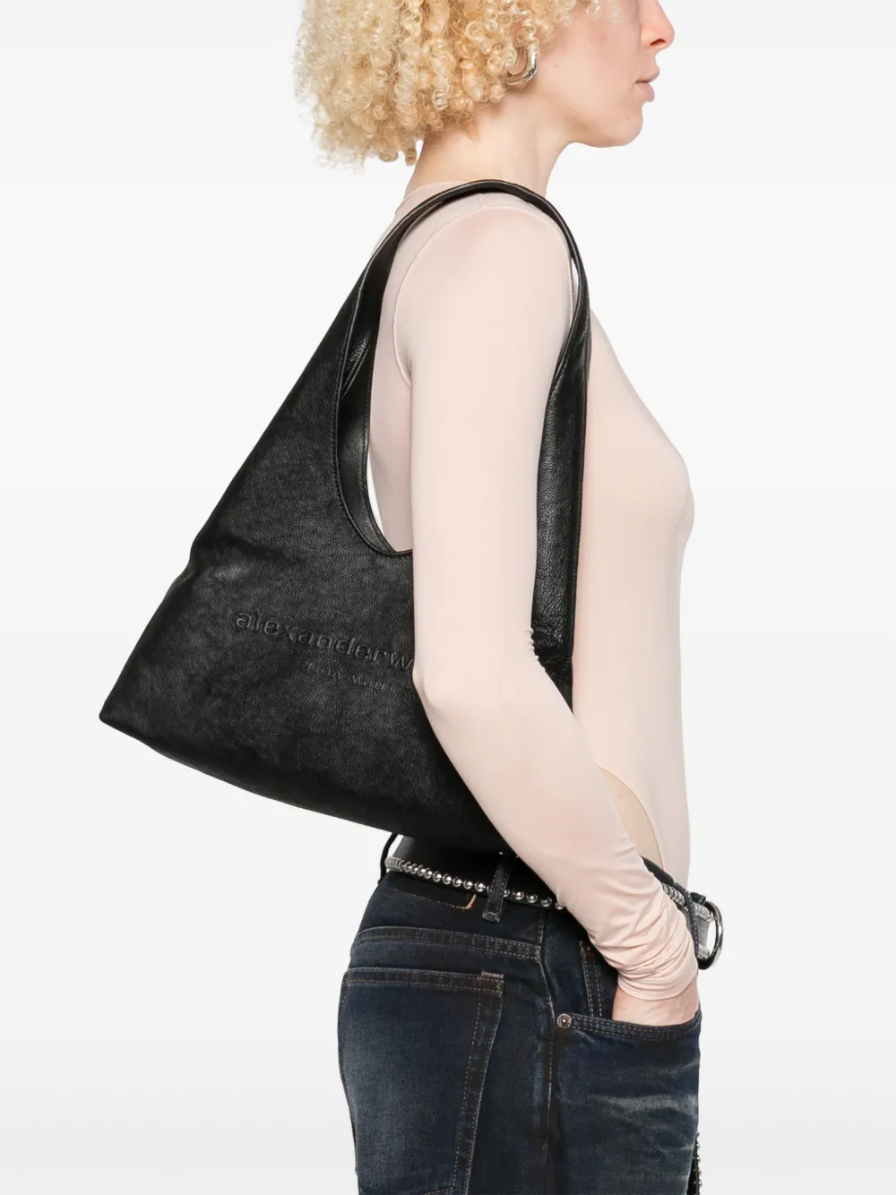 Black bag worn by a person,showing the bag fit