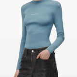 Blue top, full body view