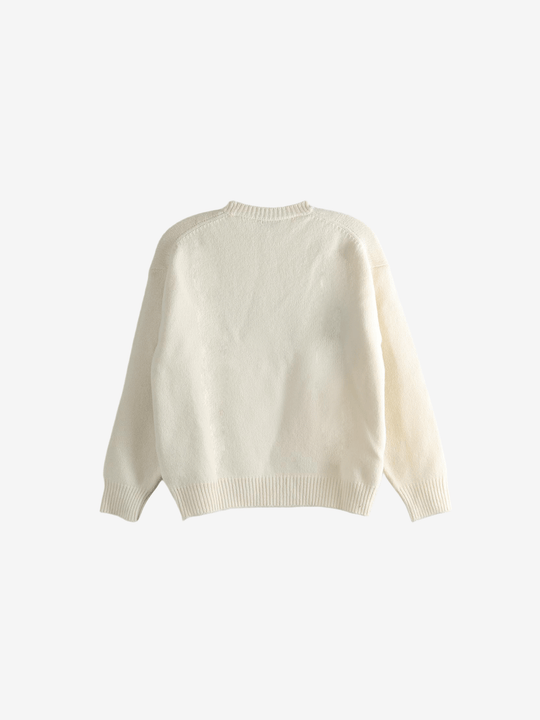 Tan sweater, back view