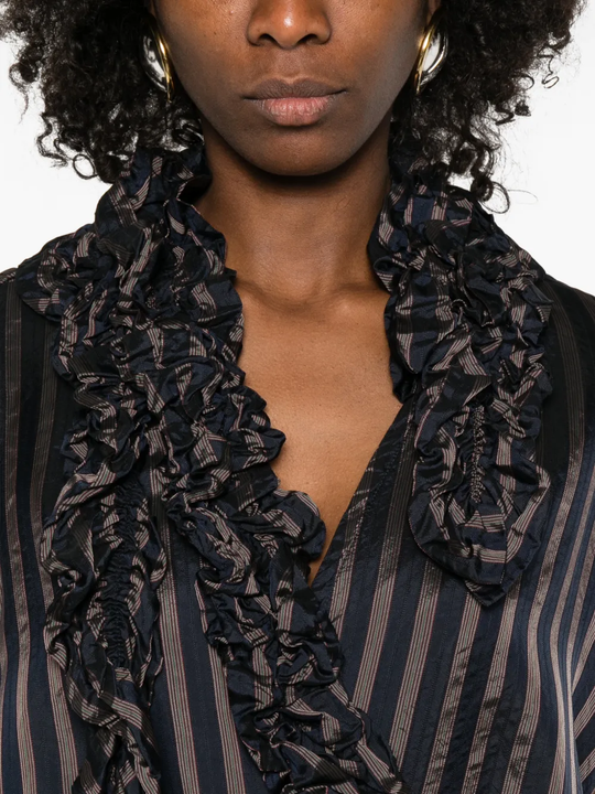 close up of black shirts, showing texture of the cupro fabric