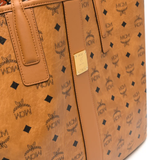 Close up of brown bag, showing texture of the leather fabric