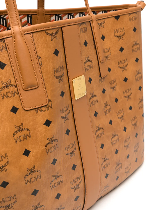 Close up of brown bag, showing texture of the leather fabric