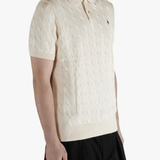 White shirt worn by a person, showing the shirt's fit