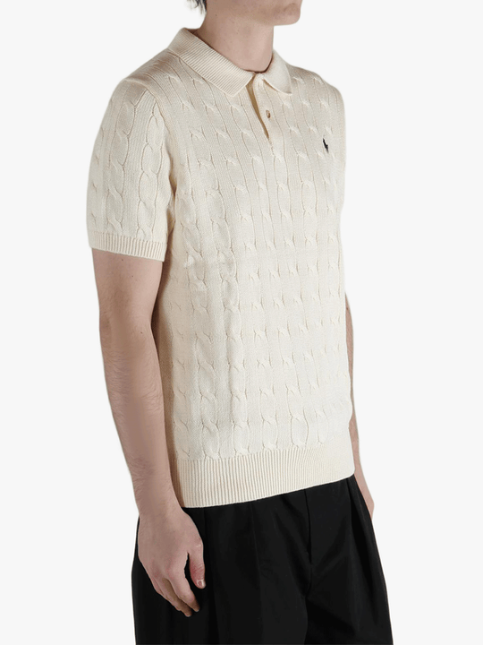 White shirt worn by a person, showing the shirt's fit