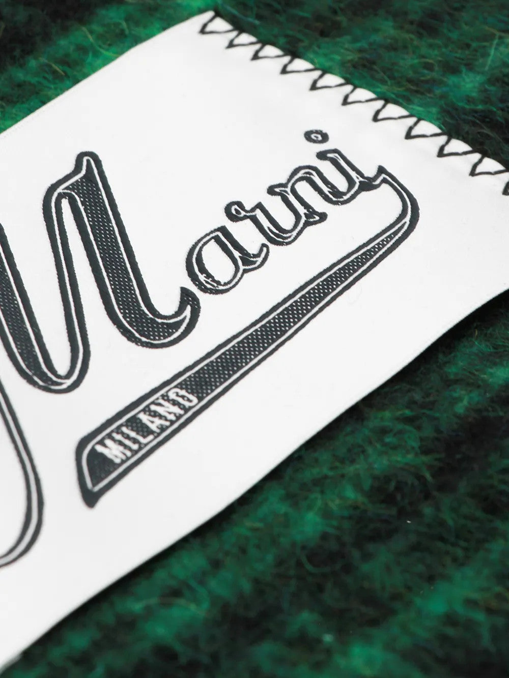 Close up of Green scarf, showing detail