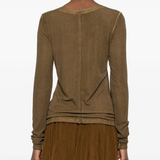 Brown tops worn by a person, showing the tops fit