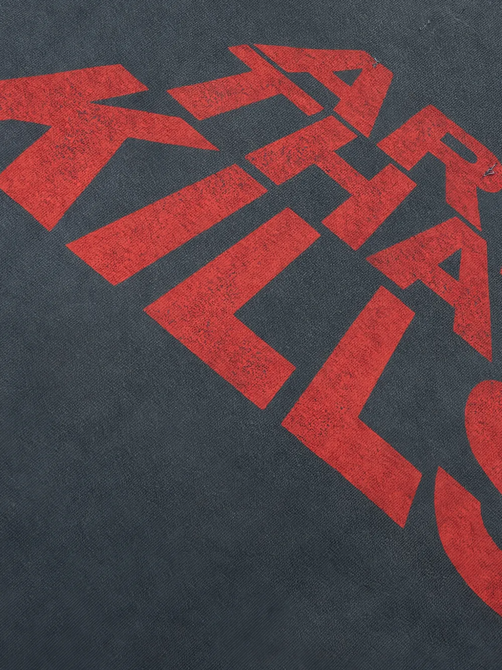 Close up of Black t-shirt, showing texture of the 100% cotton fabric