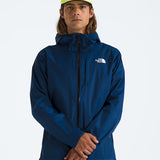 Blue jacket worn by a person, showing the jacket fit