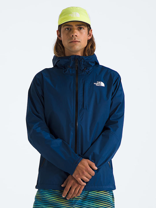 Blue jacket worn by a person, showing the jacket fit