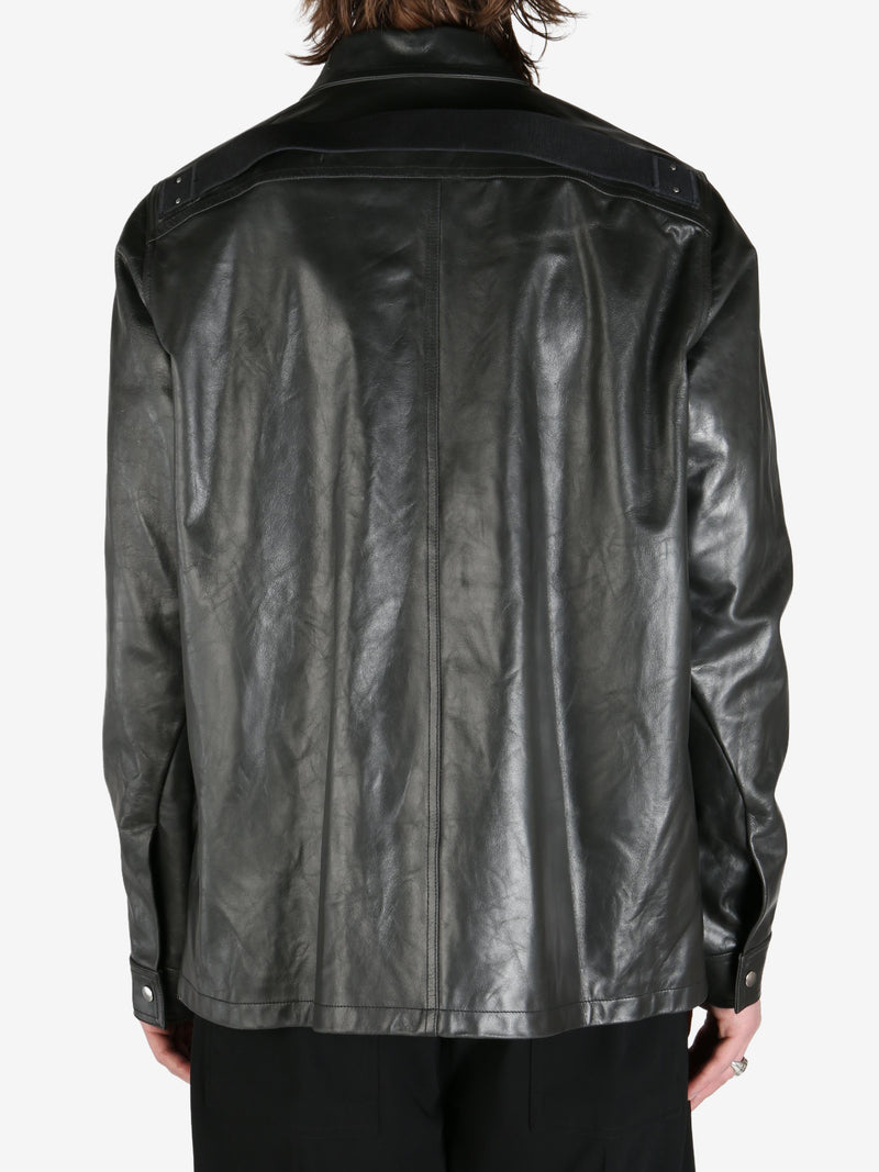 Black jacket worn by a person, showing the jacket's fit