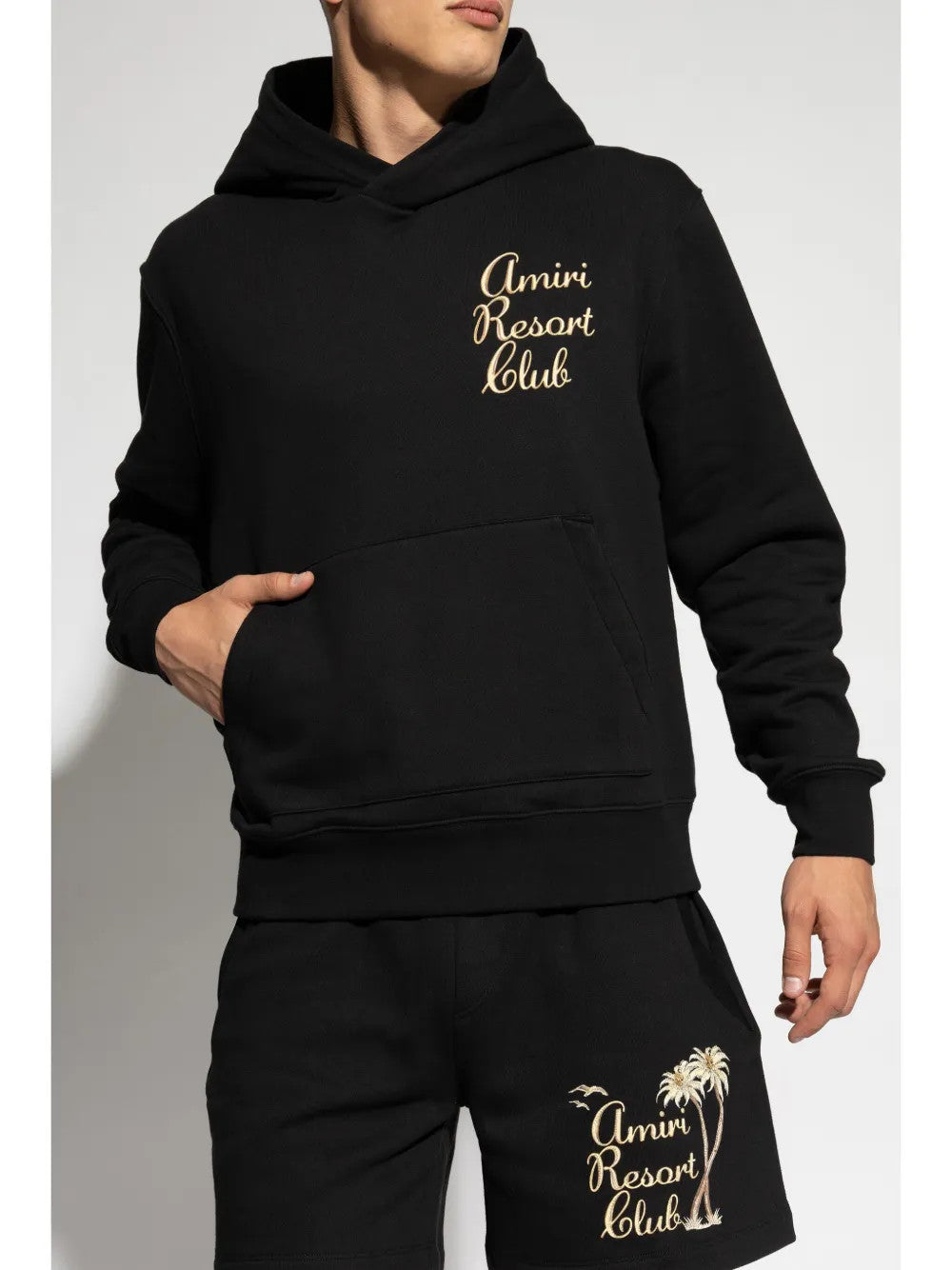 Black t-shirt worn by a person, showing the t-shirt fit