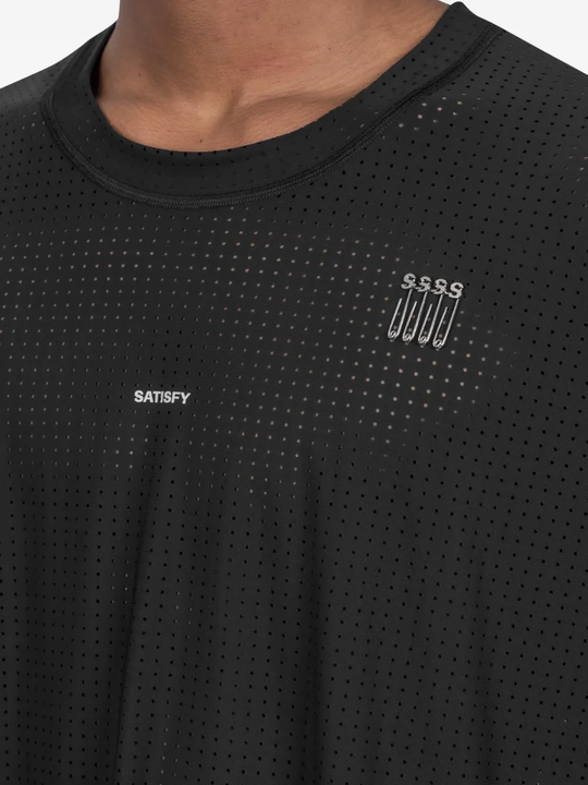 Close up of Black t-shirt, showing texture of the 73% nylon/ 27% elastane fabric