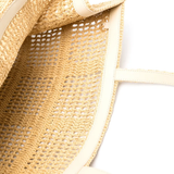 Close up of tan bags,showing texture of the straw fabric.